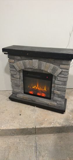 Electric fireplace with heat