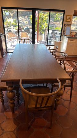 Large dining table with bench and chairs