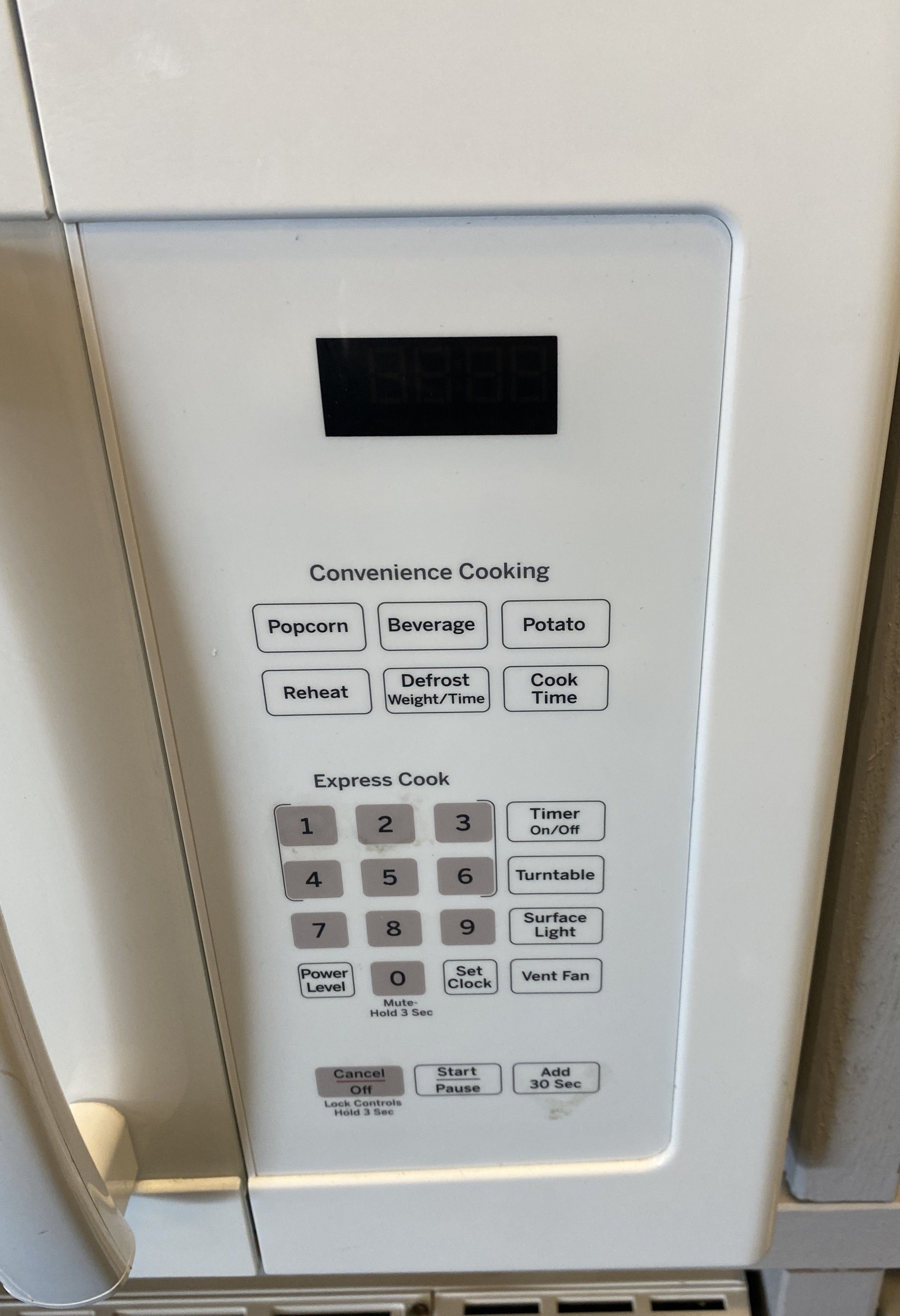 White GE Over The Range Microwave (8 0014)