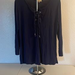 Woman’s navy blue long sleeve Top