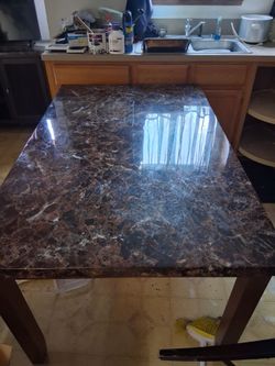 Beautiful  marble table  and stand  with 6 chairs  included