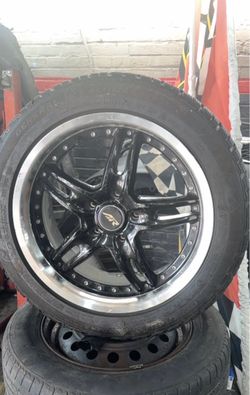 4 Black Multi-Spoke Alloy Wheel with General Tire