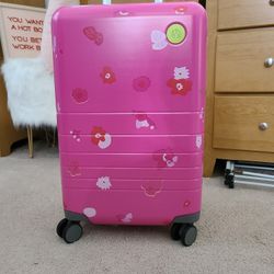 Drunk Elephant x Monos Carry-on Wheelie