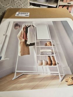 Garment rack with mirror