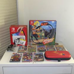 Used Nintendo Switch OLED With 7 Games, One Pro Controller, Ring Fit Adventure Set, And One Switch Case