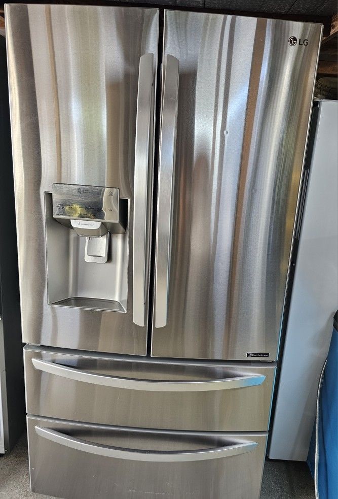 LG STAINLESS STEEL FRENCH DOOR REFRIGERATOR....4 DOORS...ICE MAKER IS NOT WORKING...EVERYTHING ELSE IS WORKING PROPERLY....$ 500
