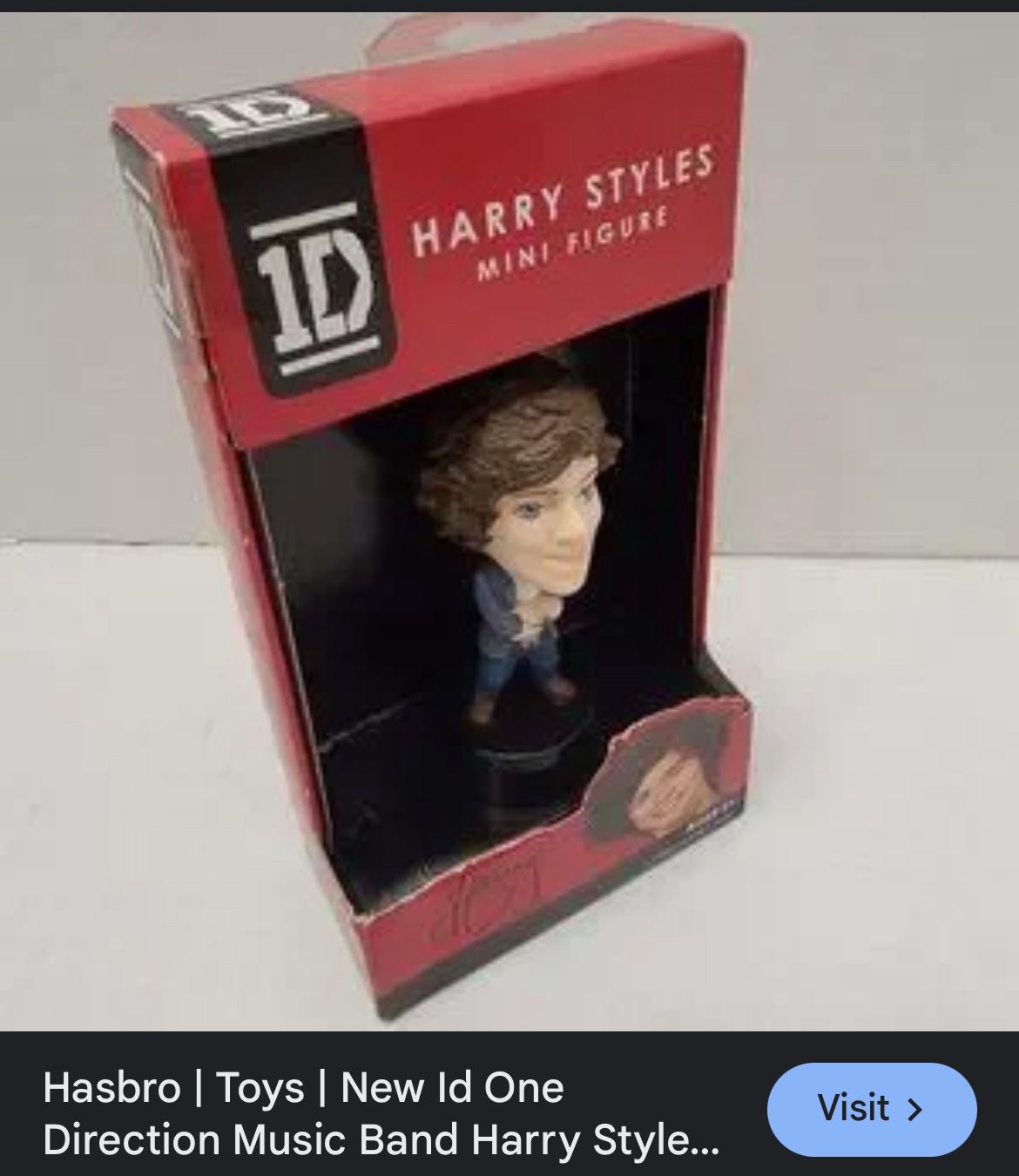 1D Harry Styles mini figure from the band One Direction. It is a 3-inch (approx. 7.6 cm) collectible action figure. The figure was released by Hasbr