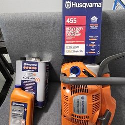 (BRAND NEW NEVER USED) Husqvarna 455 Rancher 55.5 cc 2 cyle 20" chainsaw with unopened oil and fuel mixture.