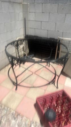 Iron table black, glass broke last year in the heat