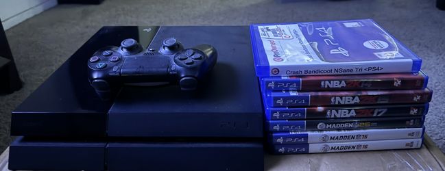 PlayStation 4 Console w/ Games