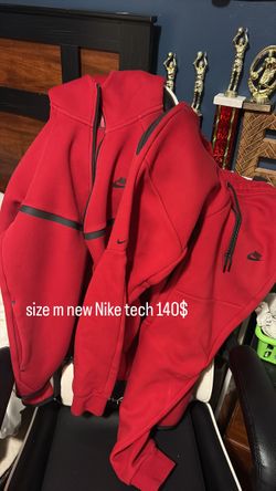 Red men’s Nike tech sweatsuit