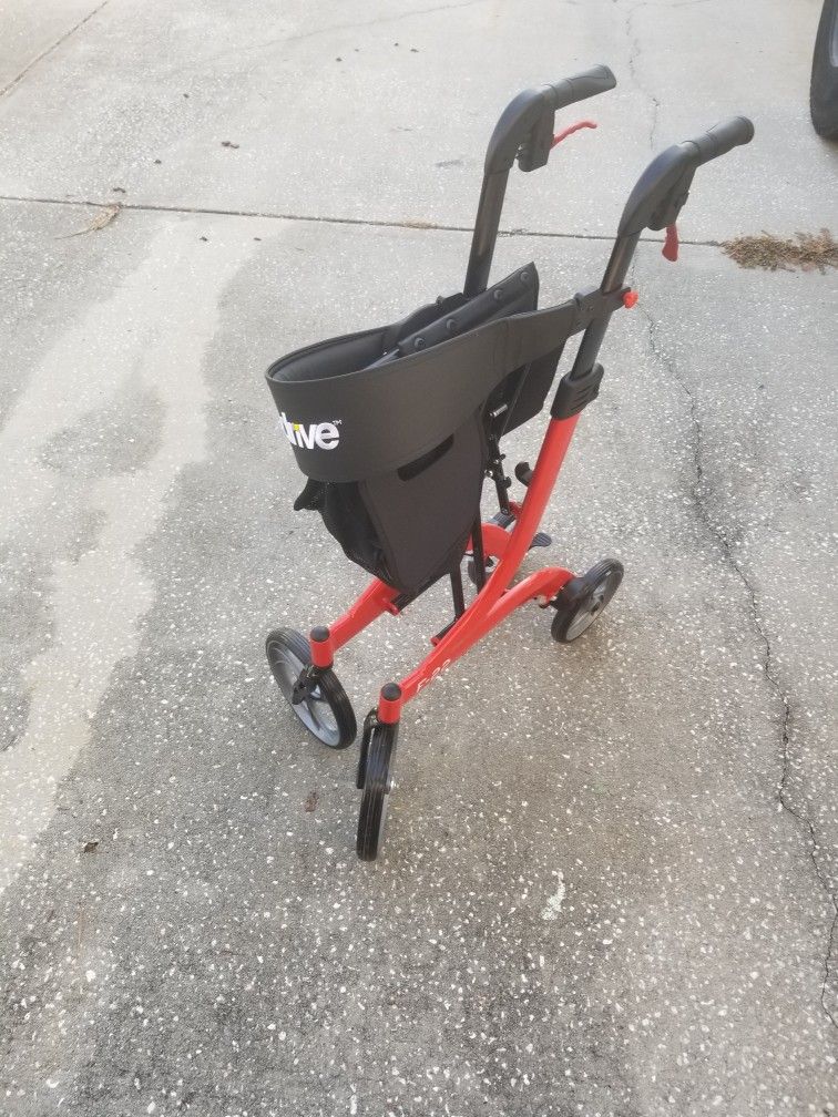 Deluxe Walker With Seat Adjustable. This Iten Is New Unsed. $100.00