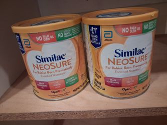 2 cans of similac . Unopened , expires 2027