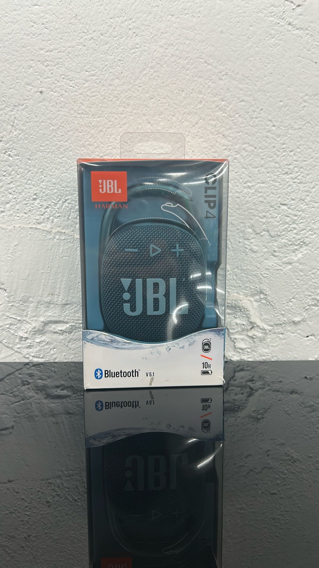 Blue JBL clip 4 Mini Bluetooth Speaker