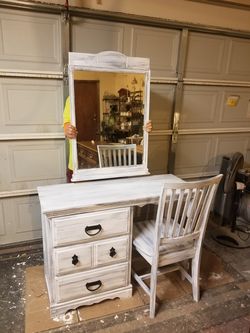Vanity with mirror and chair
