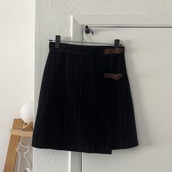 black mini skirt with leather buckle 