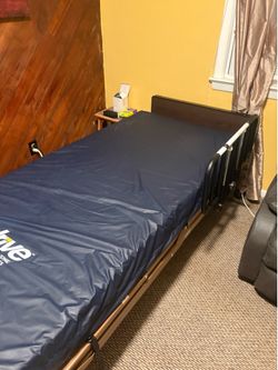 Twin size Delta Drive electric hospital bed