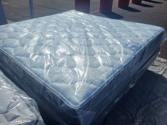 Brand New King Size pillowtop mattress and box spring Free Delivery depends on location