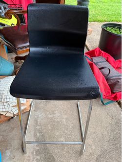 CHAIR, black & metal; 15"w x 19"deep x 25 1/2"tall; cross streets are Arapaho & Waterview
