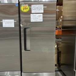 Front dent.  Polarman PLM-19RS 26 3/16" Reach-In Refrigerator with Single Solid Door, Bottom Mount, Stainless Steel, 19 cu. ft.