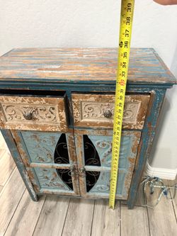 Distressed Wood Cabinet with Iron Detail