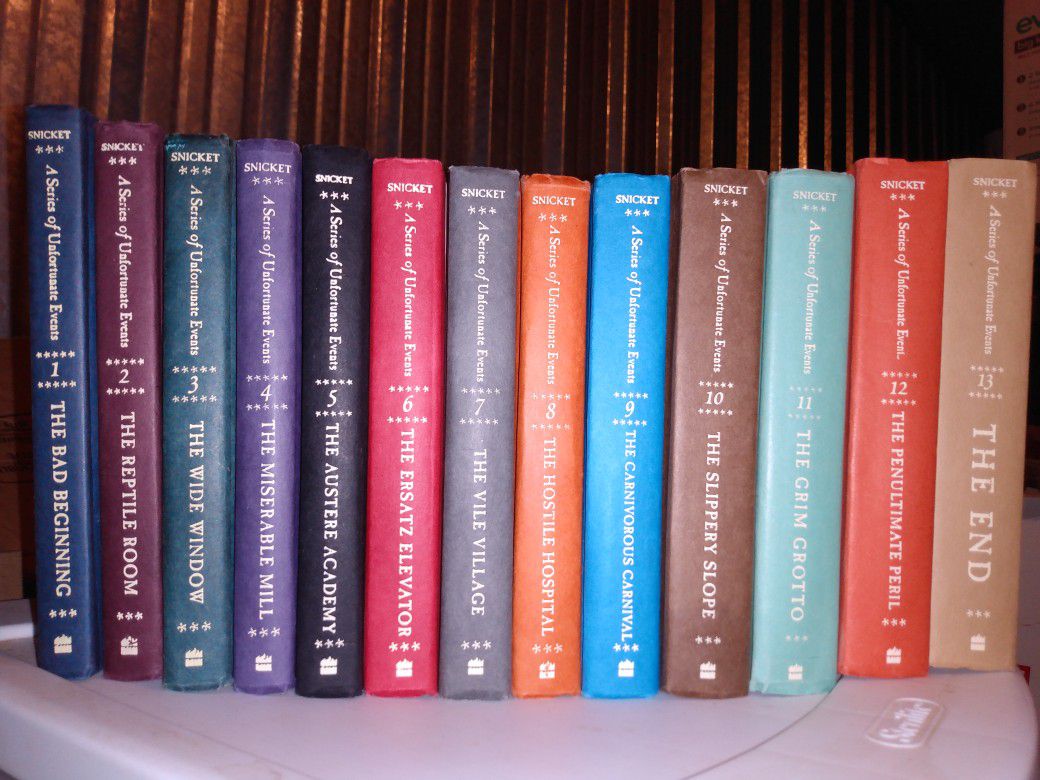 a series of unfortunate events written by Snicket volumes one through 13