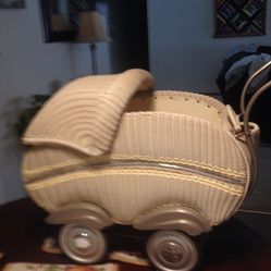 Antique wicker doll buggy