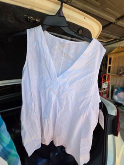2 sleeveless blouses