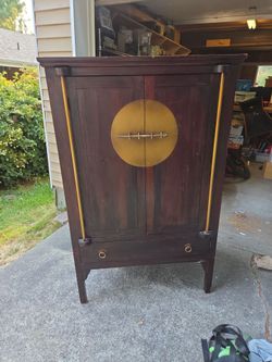 Dark Wood Cabinet with Gold Hardware