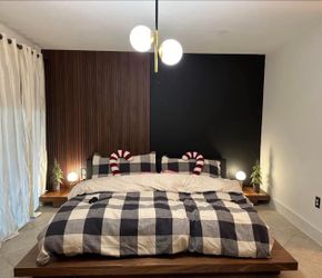 platform bed with two small tables