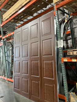 Garage door  9 (wide) x 7( high).   2 complete doors