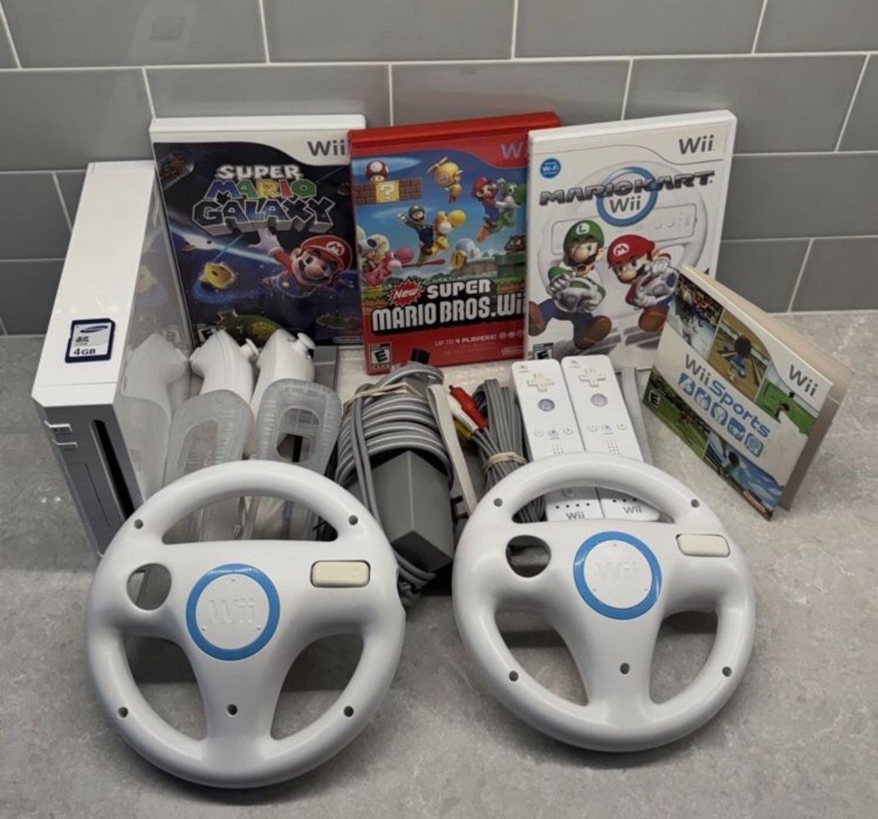 Nintendo WII Bundle With Remotes,Games,Wheels