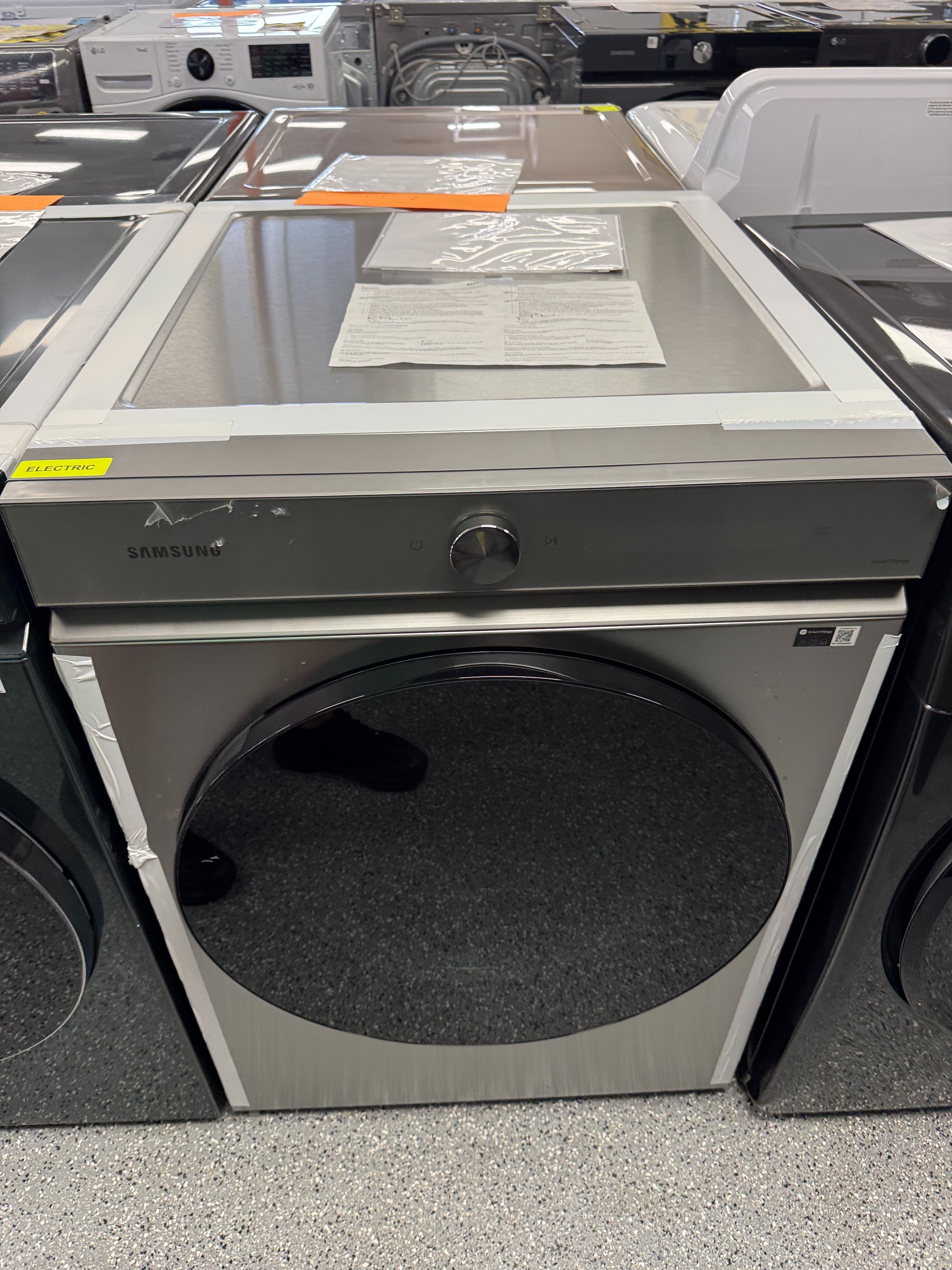 Silver Samsung Electric Dryer 7.6 Cu Ft Units are new open box scratch and dent
