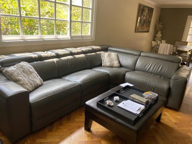 100% Leather Sectional With Electric Recliner And Adjustable Headrest