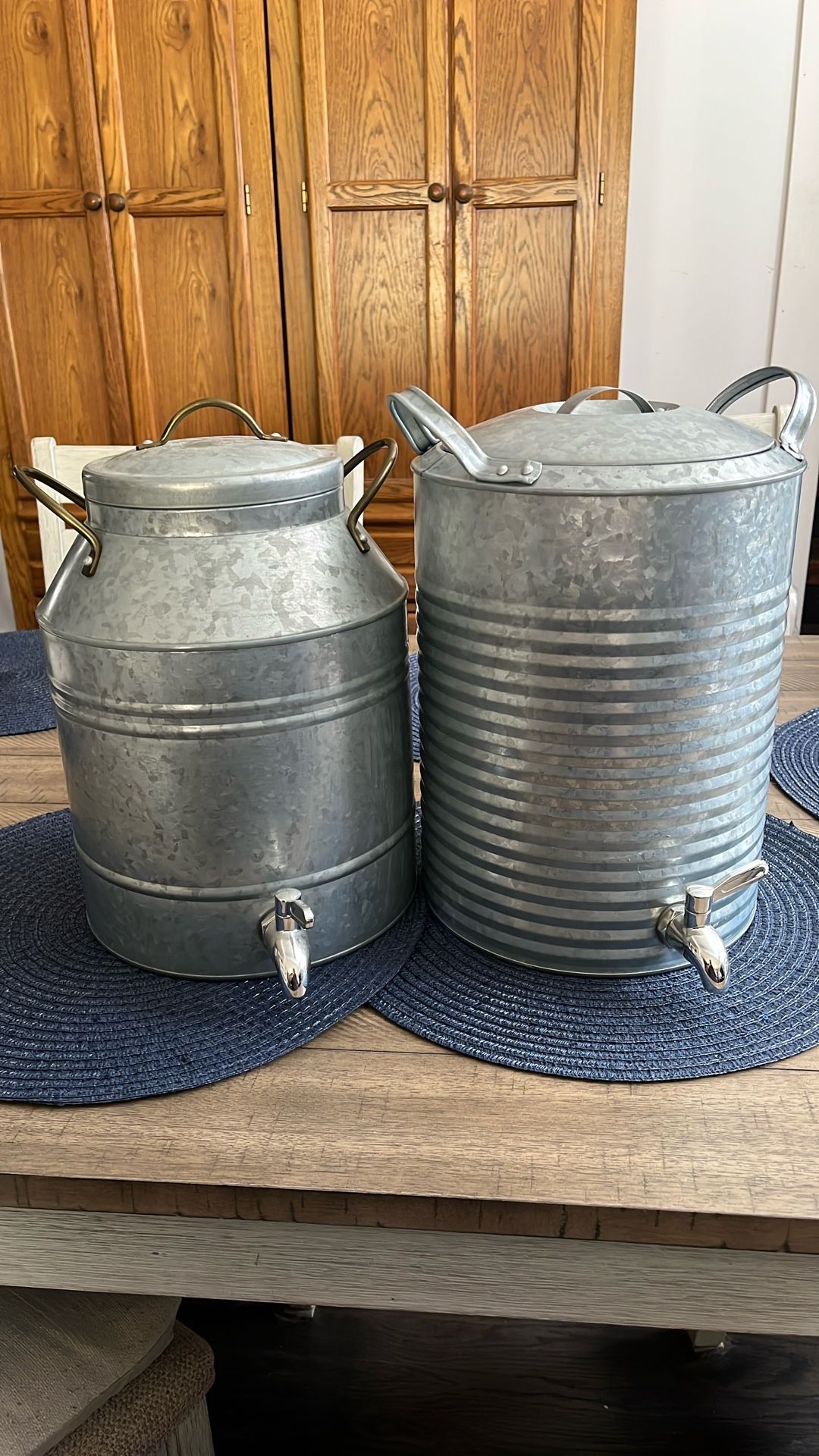 Two Milk Cans with drain spouts
