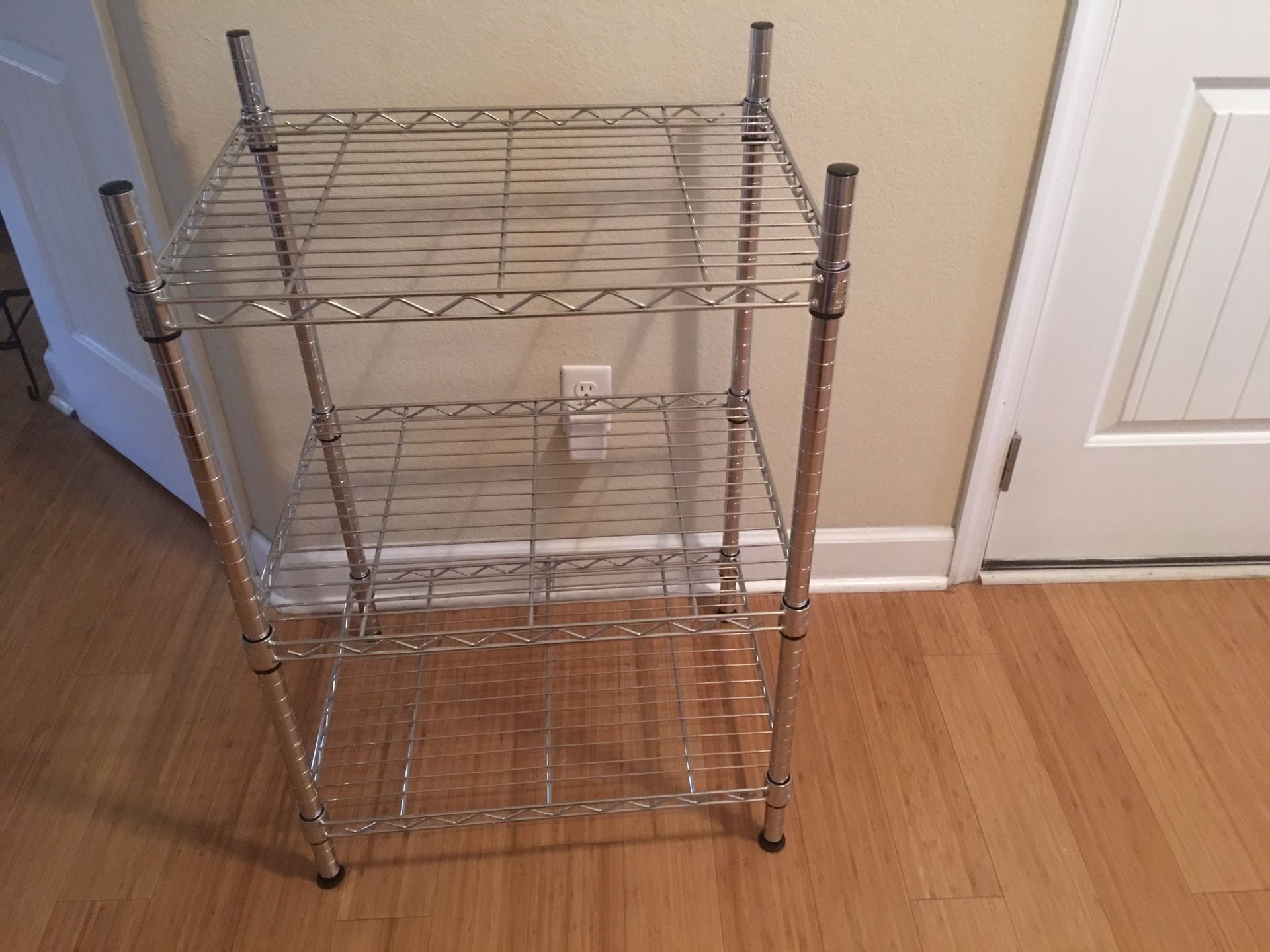 I have a metal shelf Crome brand new never use