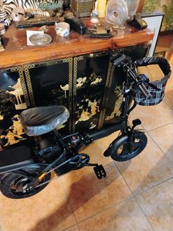 Brand new ebike 20 mph 20 miles per charge with extras charger lock tool kit charging phone holder.