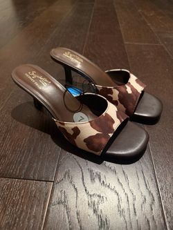 Cow print kitten heels