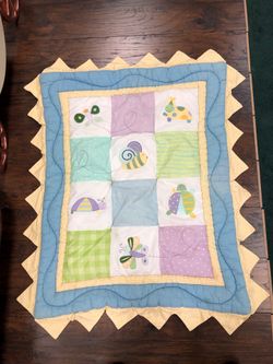 Baby quilt 30x40 new. Never used