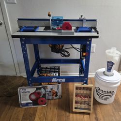 Complete Kreg router table system with accessories, Dust Deputy separator, router bit set, and more. Barely used, excellent condition. Everything work