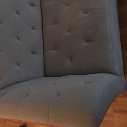 Tufted mid century modern couch.