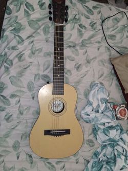 Used Fiest Act Discovery  beginning small guitar