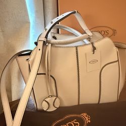 TOD’S signature Handbag Large cream color with brown piping $1200