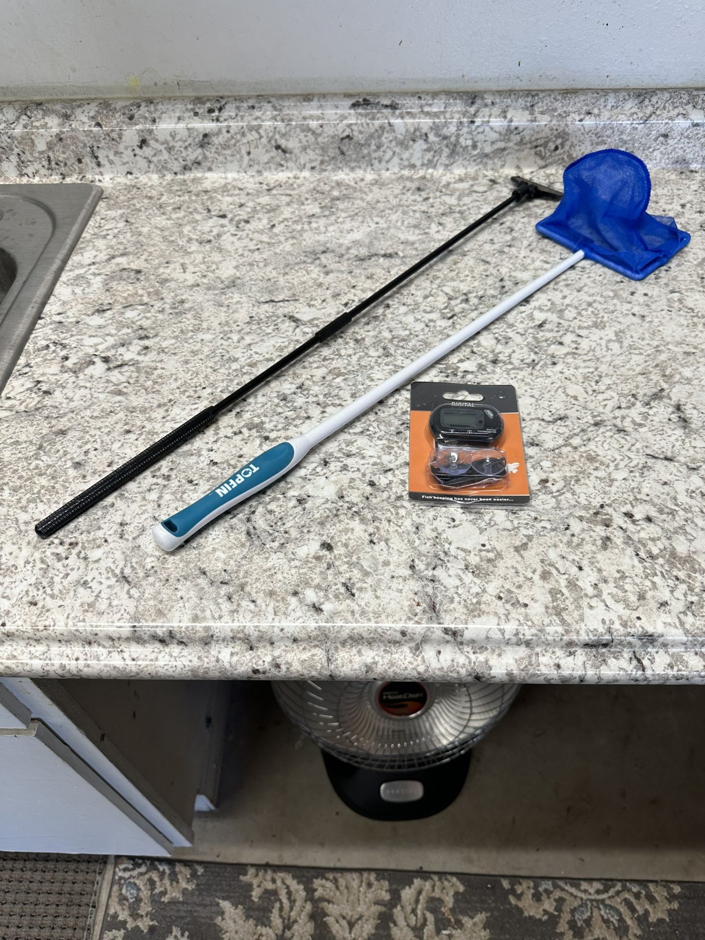 Aquarium supplies, net, scraper, and thermometer