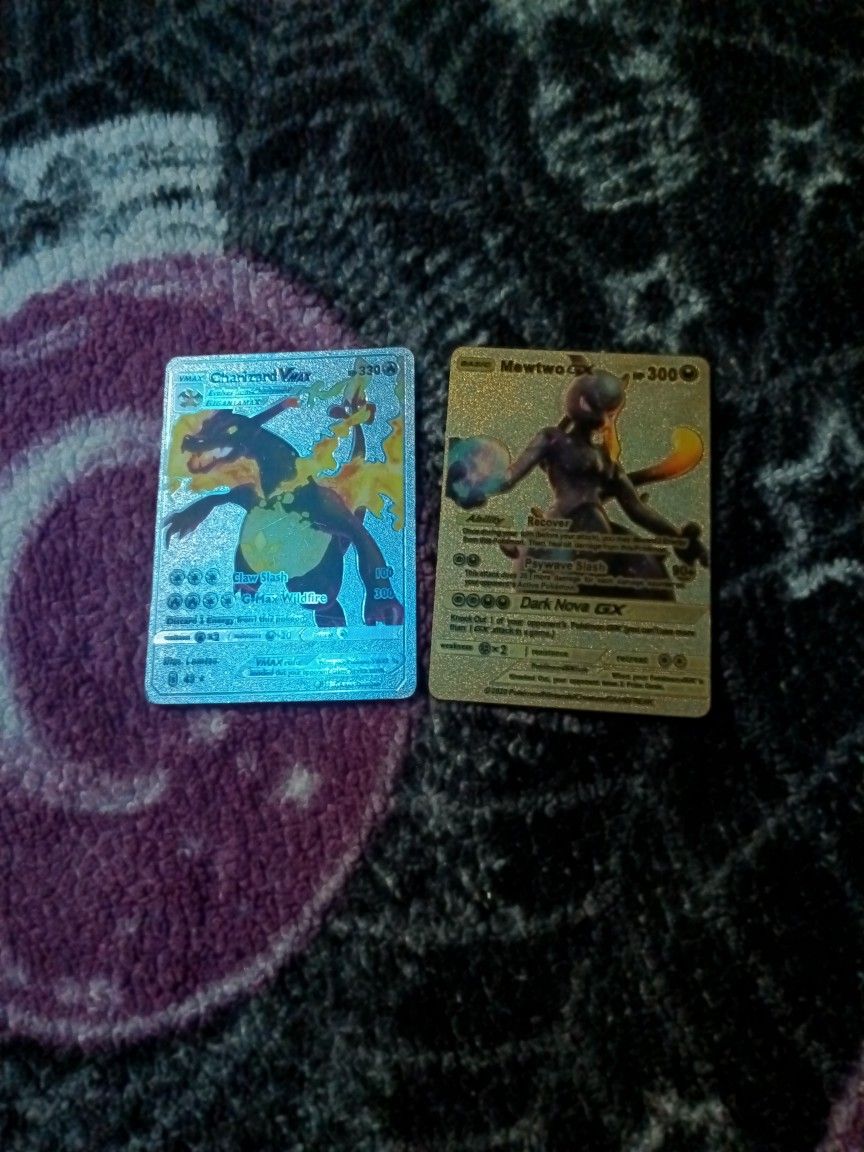 VMAX. CHARIZARD VMAN HO 330 AND BASIC Mewtwo GX HP 300