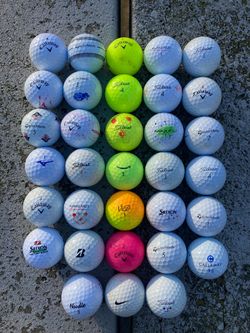 33 used golf balls