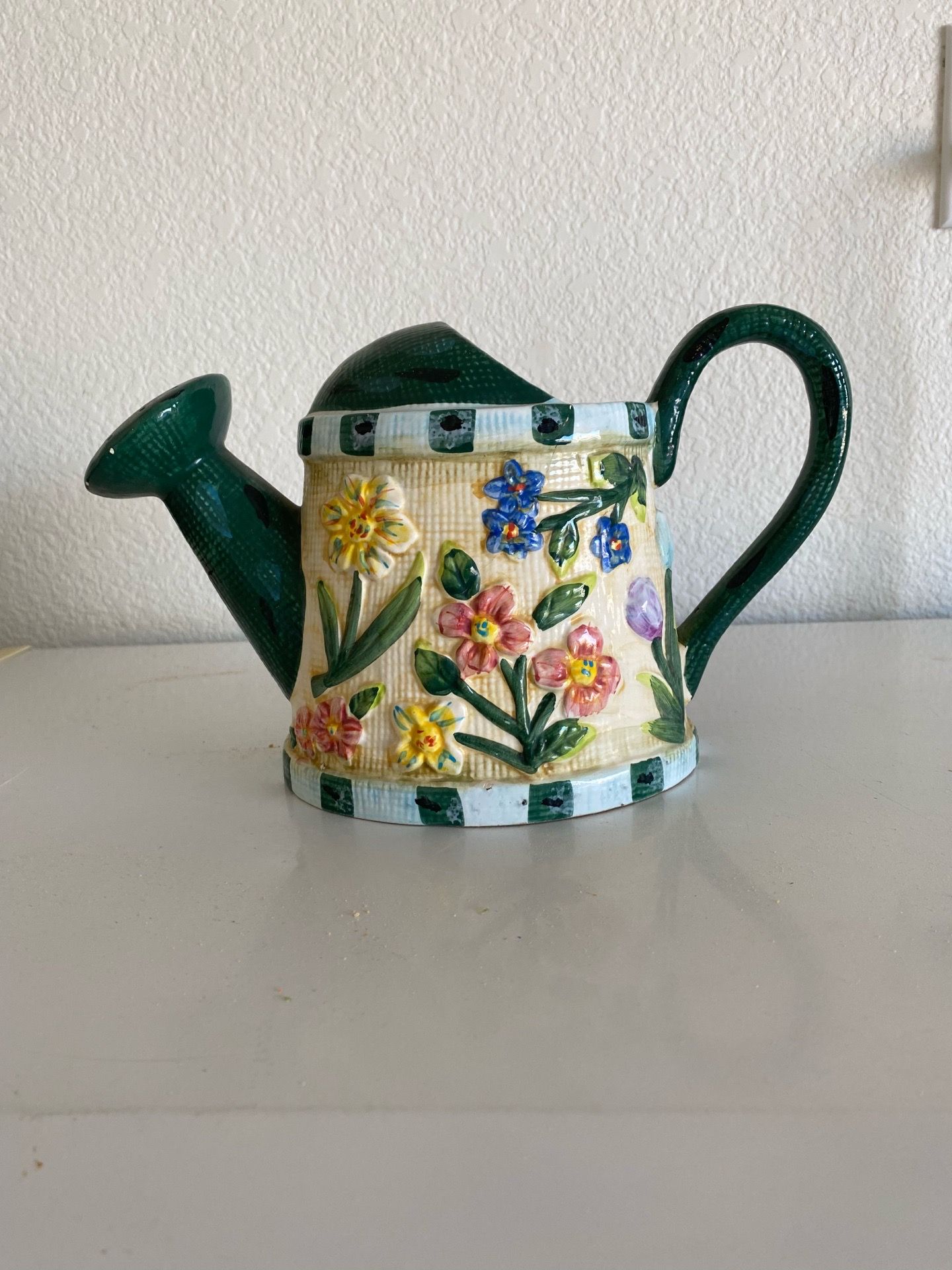 Decorative floral watering can