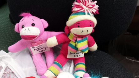 2 sock monkeys 1 of them talks