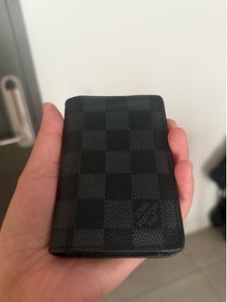 Louis Vuitton wallet worth $600
