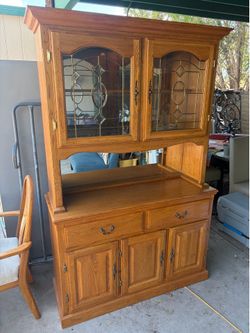 Wood hutch with mirrors and light